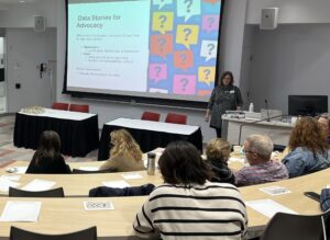 Classroom setting with presenter at the front of the room