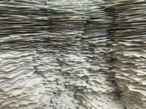An Epidemic of Writing, a Famine of Reading, and an Argument for Subtractive AI